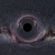 Simulación de un agujero negro con una masa de diez soles, a una distancia de 600 kilómetros, con la vía láctea al fondo. Wikimedia Commons